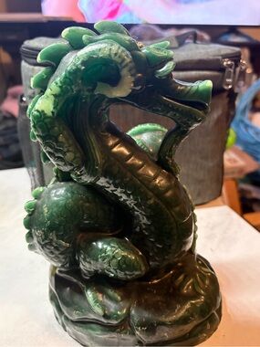 Vintage Chinese dragon sculpture made of green wax with red glass eyes